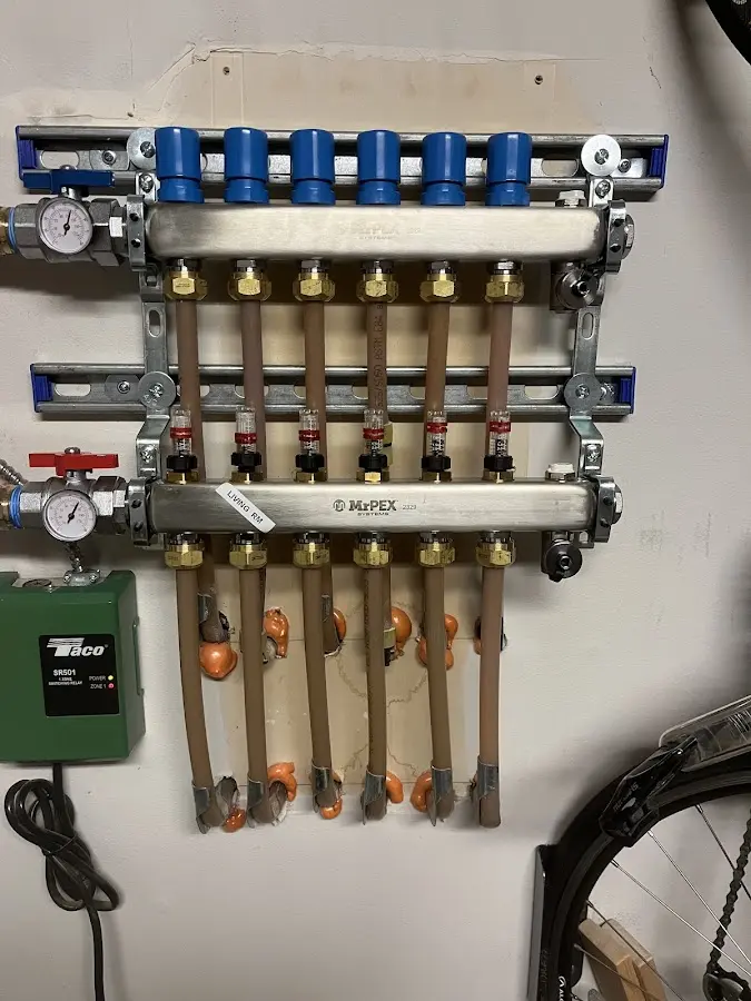 Plumber performing Gas Line Installation at a residential property in Midvale